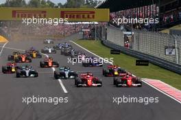 start f te race, Kimi Raikkonen (FIN) Scuderia Ferrari and Sebastian Vettel (GER) Scuderia Ferrari  30.07.2017. Formula 1 World Championship, Rd 11, Hungarian Grand Prix, Budapest, Hungary, Race Day.