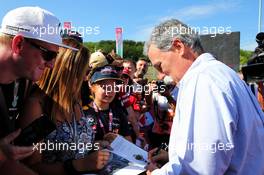 Chase Carey (USA) Formula One Group Chairman signs autographs for the fans. 29.07.2017. Formula 1 World Championship, Rd 11, Hungarian Grand Prix, Budapest, Hungary, Qualifying Day.