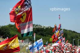 Fans in the grandstand and Ferrari flags. 29.07.2017. Formula 1 World Championship, Rd 11, Hungarian Grand Prix, Budapest, Hungary, Qualifying Day.