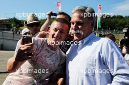 Chase Carey (USA) Formula One Group Chairman with fans. 29.07.2017. Formula 1 World Championship, Rd 11, Hungarian Grand Prix, Budapest, Hungary, Qualifying Day.
