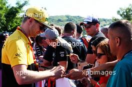Nico Hulkenberg (GER) Renault Sport F1 Team signs autographs for the fans. 29.07.2017. Formula 1 World Championship, Rd 11, Hungarian Grand Prix, Budapest, Hungary, Qualifying Day.