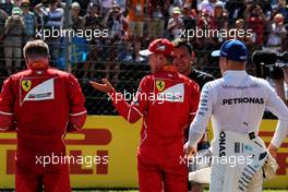 (L to R): Kimi Raikkonen (FIN) Ferrari in qualifying parc ferme with pole sitter Sebastian Vettel (GER) Ferrari; Will Buxton (GBR) NBC Sports Network TV Presenter; and Valtteri Bottas (FIN) Mercedes AMG F1. 29.07.2017. Formula 1 World Championship, Rd 11, Hungarian Grand Prix, Budapest, Hungary, Qualifying Day.