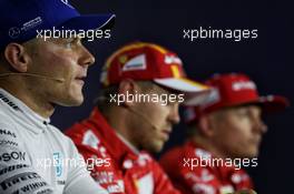 Qualifying top three in the FIA Press Conference (L to R): Valtteri Bottas (FIN) Mercedes AMG F1, third, Sebastian Vettel (GER) Ferrari; pole position; Kimi Raikkonen (FIN) Ferrari, second. 29.07.2017. Formula 1 World Championship, Rd 11, Hungarian Grand Prix, Budapest, Hungary, Qualifying Day.