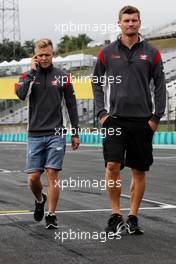 Kevin Magnussen (DEN) Haas F1 Team (Left) walks the circuit. 27.07.2017. Formula 1 World Championship, Rd 11, Hungarian Grand Prix, Budapest, Hungary, Preparation Day.