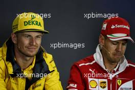 (L to R): Nico Hulkenberg (GER) Renault Sport F1 Team and Sebastian Vettel (GER) Ferrari in the FIA Press Conference. 27.07.2017. Formula 1 World Championship, Rd 11, Hungarian Grand Prix, Budapest, Hungary, Preparation Day.