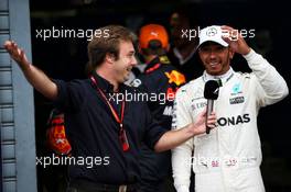 (L to R): Davide Valsecchi (ITA) Sky F1 Italia Presenter with pole sitter Lewis Hamilton (GBR) Mercedes AMG F1 in qualifying parc ferme. 02.09.2017. Formula 1 World Championship, Rd 13, Italian Grand Prix, Monza, Italy, Qualifying Day.