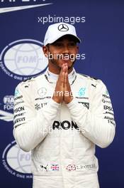 Lewis Hamilton (GBR) Mercedes AMG F1 celebrates his 69th pole position in qualifying parc ferme. 02.09.2017. Formula 1 World Championship, Rd 13, Italian Grand Prix, Monza, Italy, Qualifying Day.