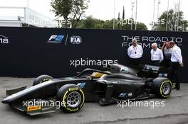 (L to R): Ross Brawn (GBR) Managing Director, Motor Sports; Charlie Whiting (GBR) FIA Delegate; Mario Isola (ITA) Pirelli Racing Manager; and Bruno Michel (FRA) F2 CEO, unveil the 2018 F2 car. 31.08.2017. Formula 1 World Championship, Rd 13, Italian Grand Prix, Monza, Italy, Preparation Day.