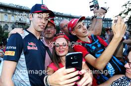 Daniil Kvyat (RUS) Scuderia Toro Rosso with fans at a drivers' parade in Milan. 31.08.2017. Formula 1 World Championship, Rd 13, Italian Grand Prix, Monza, Italy, Preparation Day.