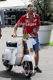 Sebastian Vettel (GER) Ferrari with his moped. 31.08.2017. Formula 1 World Championship, Rd 13, Italian Grand Prix, Monza, Italy, Preparation Day.