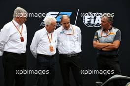(L to R): Ross Brawn (GBR) Managing Director, Motor Sports; Charlie Whiting (GBR) FIA Delegate; Bruno Michel (FRA) F2 CEO; and Mario Isola (ITA) Pirelli Racing Manager, unveil the 2018 F2 car. 31.08.2017. Formula 1 World Championship, Rd 13, Italian Grand Prix, Monza, Italy, Preparation Day.