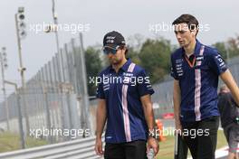 Sergio Perez (MEX) Sahara Force India F1 walks the circuit with Tim Wright (GBR) Sahara Force India F1 Team Race Engineer. 31.08.2017. Formula 1 World Championship, Rd 13, Italian Grand Prix, Monza, Italy, Preparation Day.