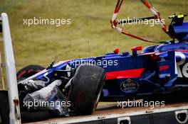 The damaged Scuderia Toro Rosso STR12 of Carlos Sainz Jr (ESP) is recovered back to the pits on the back of a truck after he crashed in the first practice session. 06.10.2017. Formula 1 World Championship, Rd 16, Japanese Grand Prix, Suzuka, Japan, Practice Day.