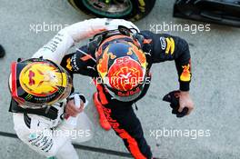 Race winner Lewis Hamilton (GBR) Mercedes AMG F1 celebrates in parc ferme with second placed Max Verstappen (NLD) Red Bull Racing. 08.10.2017. Formula 1 World Championship, Rd 16, Japanese Grand Prix, Suzuka, Japan, Race Day.