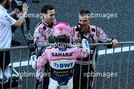Esteban Ocon (FRA) Sahara Force India F1 Team celebrates with the team in parc ferme. 08.10.2017. Formula 1 World Championship, Rd 16, Japanese Grand Prix, Suzuka, Japan, Race Day.