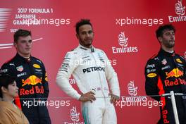 Max Verstappen (NLD) Red Bull Racing Lewis Hamilton (GBR) Mercedes AMG F1  and Daniel Ricciardo (AUS) Red Bull Racing  08.10.2017. Formula 1 World Championship, Rd 16, Japanese Grand Prix, Suzuka, Japan, Race Day.