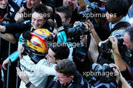 Race winner Lewis Hamilton (GBR) Mercedes AMG F1 celebrates with the team in parc ferme. 08.10.2017. Formula 1 World Championship, Rd 16, Japanese Grand Prix, Suzuka, Japan, Race Day.