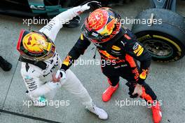 Race winner Lewis Hamilton (GBR) Mercedes AMG F1 celebrates in parc ferme with second placed Max Verstappen (NLD) Red Bull Racing. 08.10.2017. Formula 1 World Championship, Rd 16, Japanese Grand Prix, Suzuka, Japan, Race Day.