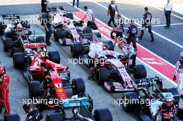 Sergio Perez (MEX) Sahara Force India F1 VJM10 and Esteban Ocon (FRA) Sahara Force India F1 VJM10 in parc ferme. 08.10.2017. Formula 1 World Championship, Rd 16, Japanese Grand Prix, Suzuka, Japan, Race Day.