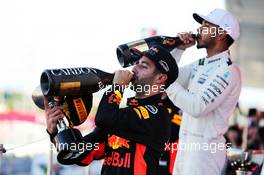 Daniel Ricciardo (AUS) Red Bull Racing celebrates his third position with the champagne on the podium. 08.10.2017. Formula 1 World Championship, Rd 16, Japanese Grand Prix, Suzuka, Japan, Race Day.