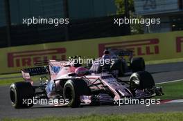 Esteban Ocon (FRA) Sahara Force India F1 VJM10 leads Sergio Perez (MEX) Sahara Force India F1 VJM10. 08.10.2017. Formula 1 World Championship, Rd 16, Japanese Grand Prix, Suzuka, Japan, Race Day.