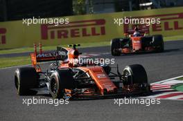 Stoffel Vandoorne (BEL) McLaren MCL32 leads Fernando Alonso (ESP) McLaren MCL32. 08.10.2017. Formula 1 World Championship, Rd 16, Japanese Grand Prix, Suzuka, Japan, Race Day.