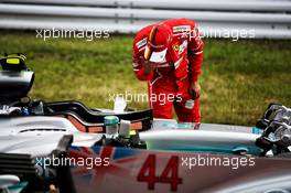 Sebastian Vettel (GER) Ferrari looks at the Mercedes AMG F1 W08 of Valtteri Bottas (FIN) Mercedes AMG F1 in qualifying parc ferme. 07.10.2017. Formula 1 World Championship, Rd 16, Japanese Grand Prix, Suzuka, Japan, Qualifying Day.