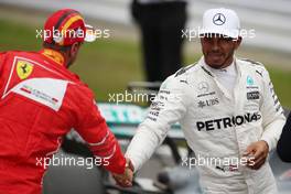 Sebastian Vettel (GER) Scuderia Ferrari and Lewis Hamilton (GBR) Mercedes AMG F1   07.10.2017. Formula 1 World Championship, Rd 16, Japanese Grand Prix, Suzuka, Japan, Qualifying Day.