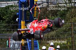 The Ferrari SF70H of Kimi Raikkonen (FIN) Ferrari is removed from the circuit after he crashed in the third practice session.