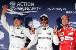 Qualifying top three in parc ferme (L to R): Valtteri Bottas (FIN) Mercedes AMG F1, second; Lewis Hamilton (GBR) Mercedes AMG F1, pole position; Sebastian Vettel (GER) Ferrari, third. 07.10.2017. Formula 1 World Championship, Rd 16, Japanese Grand Prix, Suzuka, Japan, Qualifying Day.