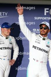 (L to R): Valtteri Bottas (FIN) Mercedes AMG F1 with pole sitter Lewis Hamilton (GBR) Mercedes AMG F1 in qualifying parc ferme. 07.10.2017. Formula 1 World Championship, Rd 16, Japanese Grand Prix, Suzuka, Japan, Qualifying Day.