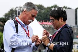 Chase Carey (USA) Formula One Group Chairman signs autographs for the fans. 07.10.2017. Formula 1 World Championship, Rd 16, Japanese Grand Prix, Suzuka, Japan, Qualifying Day.