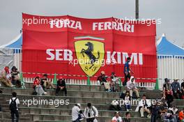 Fans in the grandstand and a banner for Ferrari. 07.10.2017. Formula 1 World Championship, Rd 16, Japanese Grand Prix, Suzuka, Japan, Qualifying Day.