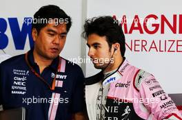 (L to R): Jun Matsuzaki (JPN) Sahara Force India F1 Team Senior Tyre Engineer with Sergio Perez (MEX) Sahara Force India F1. 07.10.2017. Formula 1 World Championship, Rd 16, Japanese Grand Prix, Suzuka, Japan, Qualifying Day.