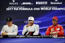 The post qualifying FIA Press Conference (L to R): Valtteri Bottas (FIN) Mercedes AMG F1, second; Lewis Hamilton (GBR) Mercedes AMG F1, pole position; Sebastian Vettel (GER) Ferrari, third. 07.10.2017. Formula 1 World Championship, Rd 16, Japanese Grand Prix, Suzuka, Japan, Qualifying Day.