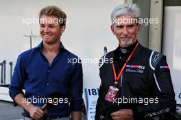 (L to R): Nico Rosberg (GER) with Damon Hill (GBR) Sky Sports Presenter. 08.10.2017. Formula 1 World Championship, Rd 16, Japanese Grand Prix, Suzuka, Japan, Race Day.