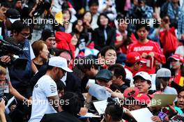 Lewis Hamilton (GBR) Mercedes AMG F1 with the fans in the grandstand. 05.10.2017. Formula 1 World Championship, Rd 16, Japanese Grand Prix, Suzuka, Japan, Preparation Day.