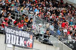 Fans in the grandstand and an old banner for Nico Hulkenberg (GER) Renault Sport F1 Team. 05.10.2017. Formula 1 World Championship, Rd 16, Japanese Grand Prix, Suzuka, Japan, Preparation Day.
