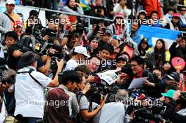 Lewis Hamilton (GBR) Mercedes AMG F1 with the fans in the grandstand. 05.10.2017. Formula 1 World Championship, Rd 16, Japanese Grand Prix, Suzuka, Japan, Preparation Day.