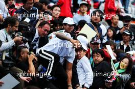 Lewis Hamilton (GBR) Mercedes AMG F1 with the fans in the grandstand. 05.10.2017. Formula 1 World Championship, Rd 16, Japanese Grand Prix, Suzuka, Japan, Preparation Day.