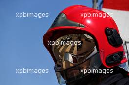 Valtteri Bottas (FIN) Mercedes AMG F1 W08 reflected in a fire marshal's visor. 28.05.2017. Formula 1 World Championship, Rd 6, Monaco Grand Prix, Monte Carlo, Monaco, Race Day.