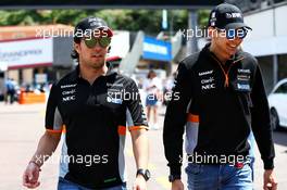 (L to R): Sergio Perez (MEX) Sahara Force India F1 with Esteban Ocon (FRA) Sahara Force India F1 Team. 24.05.2017. Formula 1 World Championship, Rd 6, Monaco Grand Prix, Monte Carlo, Monaco, Preparation Day.