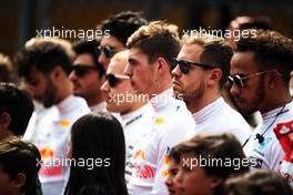 Sebastian Vettel (GER) Ferrari as the grid observes the national anthem. 29.10.2017. Formula 1 World Championship, Rd 18, Mexican Grand Prix, Mexico City, Mexico, Race Day.