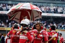 Sebastian Vettel (GER) Ferrari on the grid. 29.10.2017. Formula 1 World Championship, Rd 18, Mexican Grand Prix, Mexico City, Mexico, Race Day.
