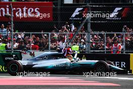 Lewis Hamilton (GBR) Mercedes AMG F1 W08 celebrates winning the World Championship in parc ferme. 29.10.2017. Formula 1 World Championship, Rd 18, Mexican Grand Prix, Mexico City, Mexico, Race Day.