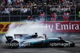 Lewis Hamilton (GBR) Mercedes AMG F1 W08 celebrates winning the World Championship in parc ferme. 29.10.2017. Formula 1 World Championship, Rd 18, Mexican Grand Prix, Mexico City, Mexico, Race Day.