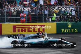 Lewis Hamilton (GBR) Mercedes AMG F1 W08 celebrates winning the World Championship in parc ferme. 29.10.2017. Formula 1 World Championship, Rd 18, Mexican Grand Prix, Mexico City, Mexico, Race Day.