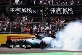 Lewis Hamilton (GBR) Mercedes AMG F1 W08 celebrates winning the World Championship in parc ferme. 29.10.2017. Formula 1 World Championship, Rd 18, Mexican Grand Prix, Mexico City, Mexico, Race Day.