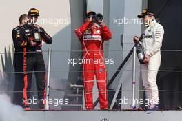 Max Verstappen (NLD) Red Bull Racing RB13 with Kimi Raikkonen (FIN) Ferrari SF70H and Valtteri Bottas (FIN) Mercedes AMG F1 W08. 29.10.2017. Formula 1 World Championship, Rd 18, Mexican Grand Prix, Mexico City, Mexico, Race Day.