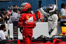 Kimi Raikkonen (FIN) Ferrari and Valtteri Bottas (FIN) Mercedes AMG F1 in parc ferme. 29.10.2017. Formula 1 World Championship, Rd 18, Mexican Grand Prix, Mexico City, Mexico, Race Day.